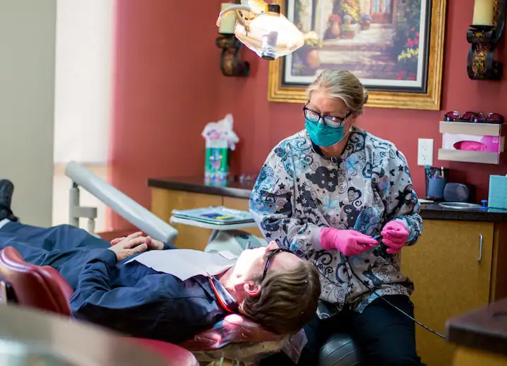 Team member treating patient at Robert F. Walker Jr. DDS in Chandler, AZ 