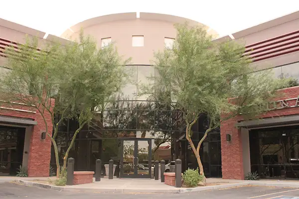 Front of office building with trees at Robert F. Walker Jr. DDS in Chandler, AZ 